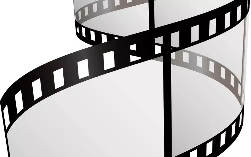 A curl of 35mm film with blank frames
