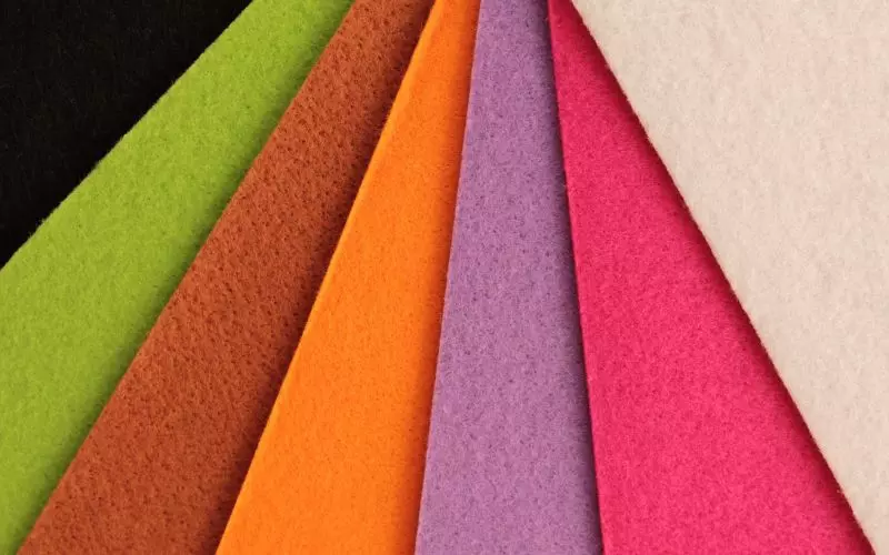 Sheets of colored felt layered in a row