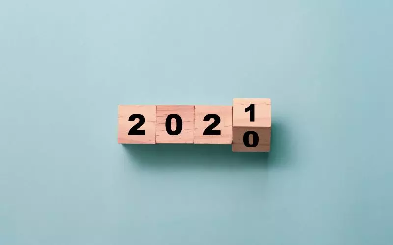 Wooden blocks turning the year 2020 to 2021