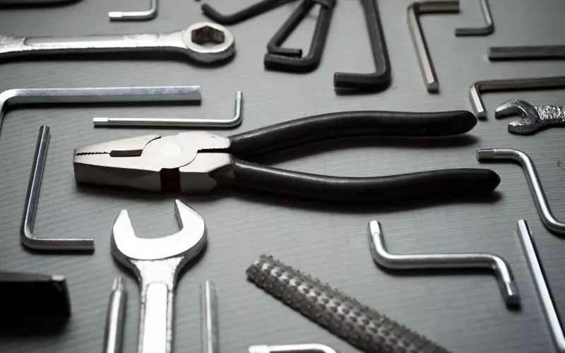 Hand tools arranged in a neat flat lay