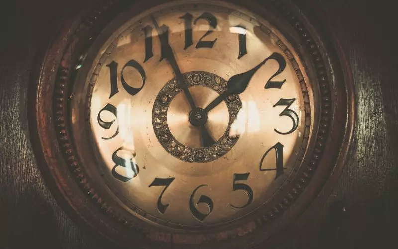 The face of an ornate antique clock