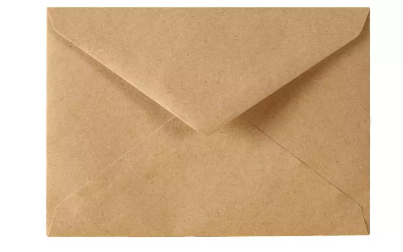 A plain kraft envelope on a white surface