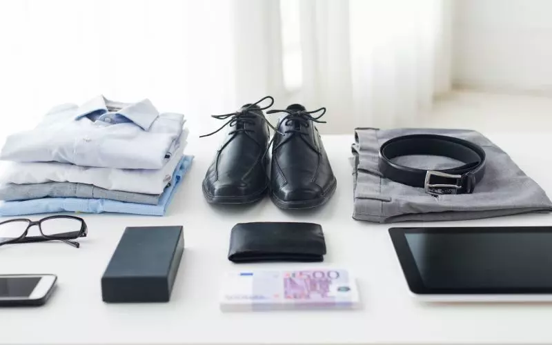 Folded clothing and accessories laid out