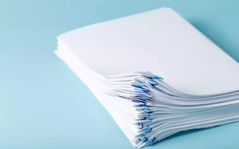 A neat stack of paper seen edge on